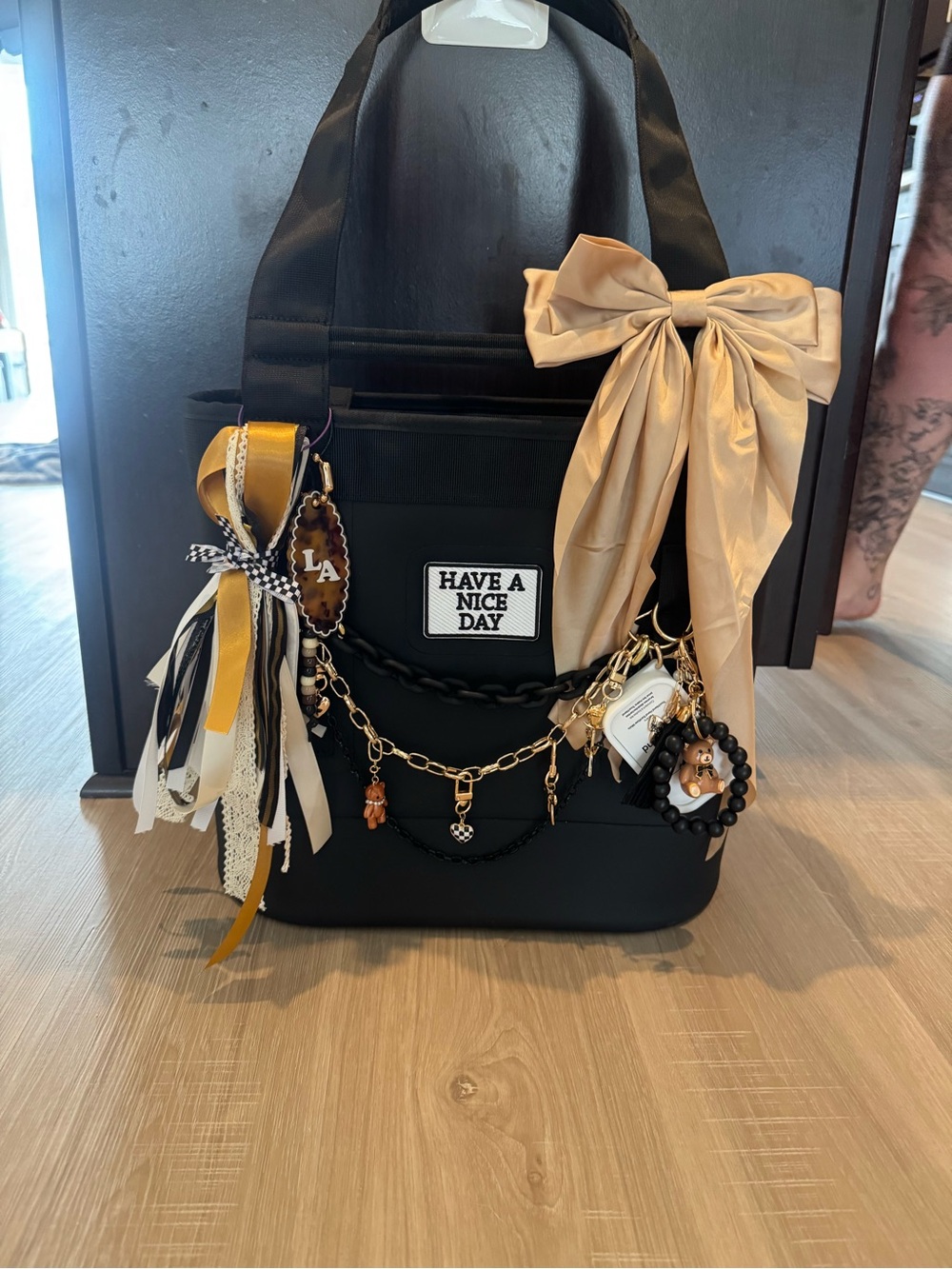 Yeti Black Tote Bag with Beige Bow and Gold Accents